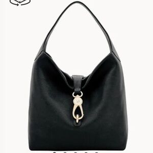 D&B shoulder bag. Used. Like new. Includes dust bag.